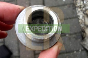 Extension case drain plug