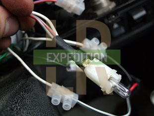The separate bulb for the gearbox temperature warning light